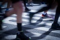 Closeup on marathon runners legs and feet with motion blur Royalty Free Stock Photo