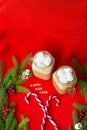 Closeup of marshmellou cocoa and candy on a red background. The inscription Happy New Year Royalty Free Stock Photo