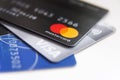 Close up of MasterCard, Visa Cards on white background with Copyspace