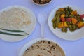 Closeup of matar paneer veg, mashroom soup, roti chapati and rice Indian food isolated over white background