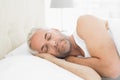 Closeup of a mature man sleeping in bed