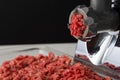 Closeup of meat being grinded