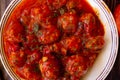 Closeup Meatballs in sweet and sour tomato sauce. Top view