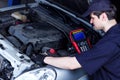 Mechanic engineer repair car at car service station Royalty Free Stock Photo