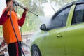 Closeup Of A Mechanic Washing A Car By Pressured Water At Garage Royalty Free Stock Photo