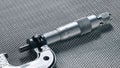 A closeup of a mechanical precision micrometer Royalty Free Stock Photo