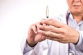 Closeup of medical doctor hand holding syringe for injection Royalty Free Stock Photo