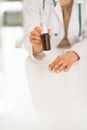 Closeup on medical doctor showing medicine bottle Royalty Free Stock Photo