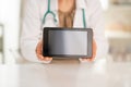 Closeup on medical doctor woman showing tablet pc Royalty Free Stock Photo