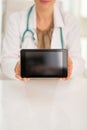 Closeup on medical doctor woman showing tablet pc Royalty Free Stock Photo