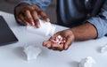Closeup Of Medical Pills In Black Man`s Hand, Cropped