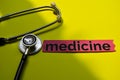 Closeup medicine with stethoscope concept inspiration on yellow background