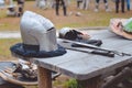 Closeup of medieval armors on old wooden table in