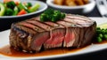 Closeup Medium ripe Steak on White Ceramic Plate Top With Brocco