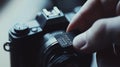 Closeup of hands inserting memory card into camera in professional photography studio - digital storage concept