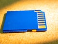 A closeup of a memory card lying on the table Royalty Free Stock Photo