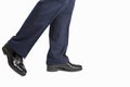 Closeup of Men's Stylish Semi-Brogue Oxford Shoes on a Walking M