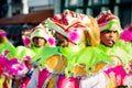 Closeup men in scary clowns costumes pass by city street at dominican carnival Royalty Free Stock Photo