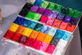 Closeup of messy, used water-color paint-box and artist brush mix color oil painting on palette Royalty Free Stock Photo