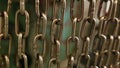 Closeup of metal chain links. Industrial texture of chains on blurred background Royalty Free Stock Photo