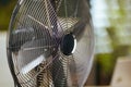 Summer time. Closeup on metal fan