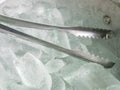 Closeup of the metal ice tong. Royalty Free Stock Photo