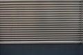 Closeup metal ventilation grille horizontal divisions background