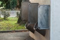 metallic public toilets for men in urban park Royalty Free Stock Photo