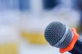 Closeup microphone on blurred background.