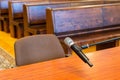 Closeup of microphone in the courthouse. Justice system, witness testimony. Nobody