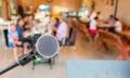 Closeup microphone on stage in restaurant