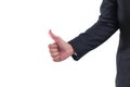 Closeup Midsection of businessman hand showing thumbs up sign against isolated on white background