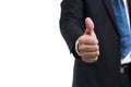 Closeup midsection of businessman wear black suit hand showing thumbs up sign against isolated on white background.