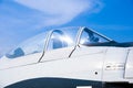 Closeup of military fighter jet cockpit and canopy against a blue sky,aircraft canopy against Royalty Free Stock Photo