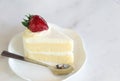 Closeup Milk cake delicious on glass table background, selective focus