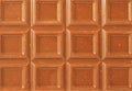 Closeup milk chocolate bar with nuts Royalty Free Stock Photo