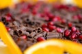 Closeup of milk chocolate chips and pomegranate Royalty Free Stock Photo