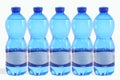 Closeup of mineral water bottles isolated on a white background Royalty Free Stock Photo