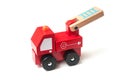 Miniature toy, wooden fire truck on white background Royalty Free Stock Photo