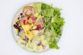 Closeup mixed of fresh salad and fruit. Royalty Free Stock Photo