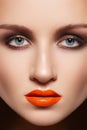 Closeup model face with fashion make-up, lip gloss Royalty Free Stock Photo