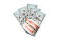 Closeup model of a human jaw with white teeth and dollar bill. Dentistry conceptual photo. Prosthetic dentistry. False