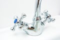 Closeup of modern bathroom chrome faucet Royalty Free Stock Photo