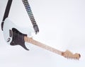 Closeup .modern electric guitar on a white background. Royalty Free Stock Photo