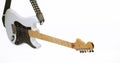 Closeup .modern electric guitar on a white background. Royalty Free Stock Photo