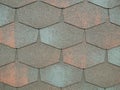 Closeup of modern heaxgon roof shingles tiles. waterproof scabrous rough surface for house exterior cover