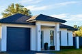 A closeup of a modern home in a residential area Royalty Free Stock Photo