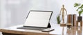 Closeup, modern home working space with portable tablet with magic keyboard