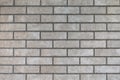 Closeup of modern neutral grey brick wall Royalty Free Stock Photo