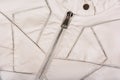 Closeup of modern white ladies` leather jacket